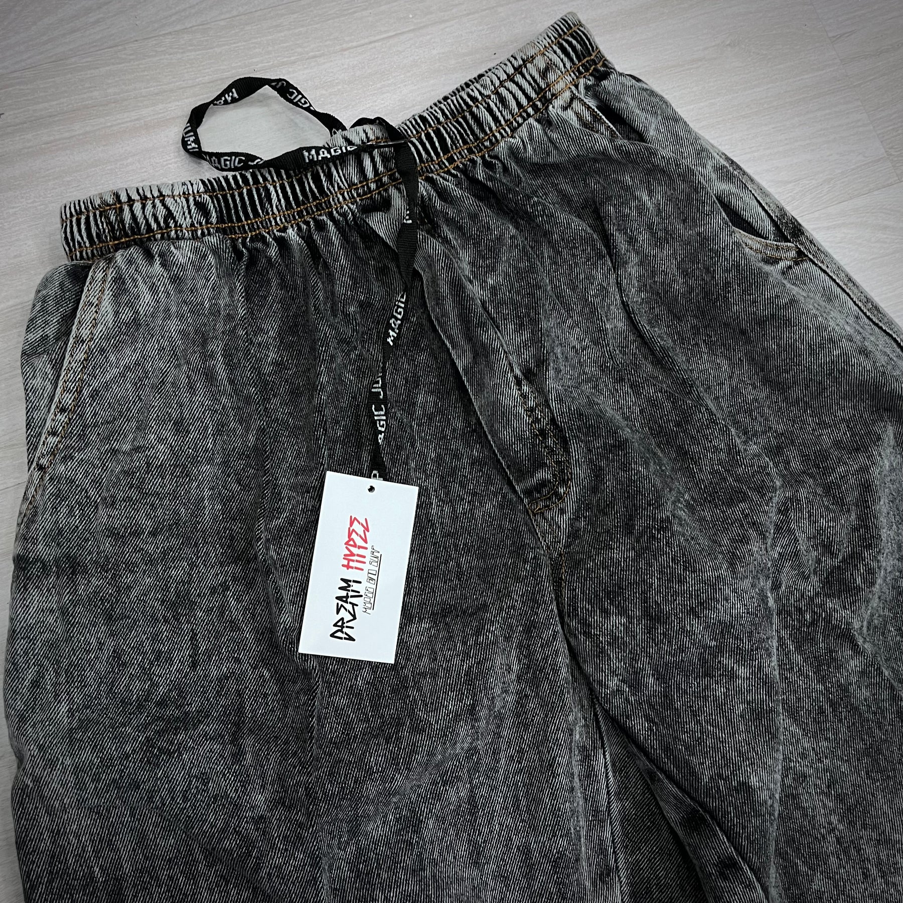 Calça balão jeans marmorizada